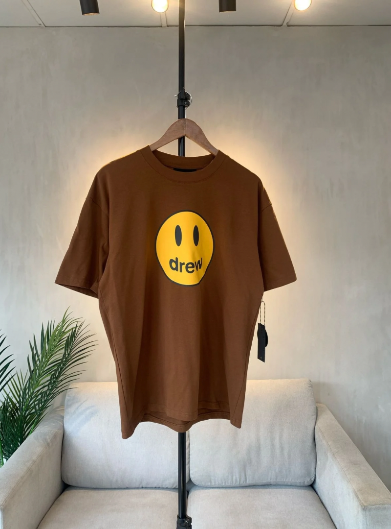 Camiseta Drew House Smiley Logo Café —