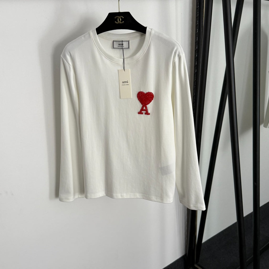 Camiseta de Manga Larga “Detalle Love” ·