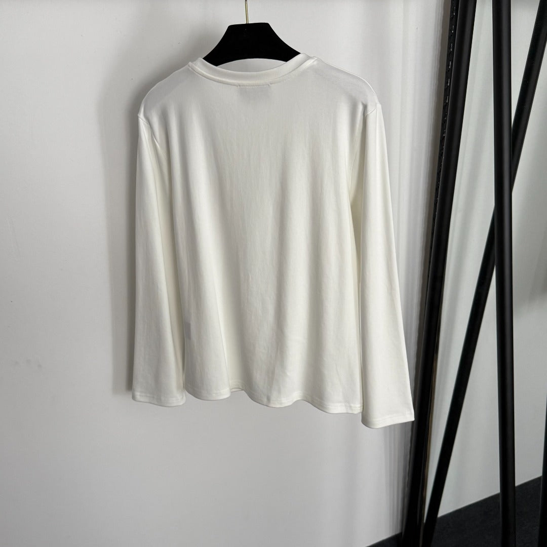 Camiseta de Manga Larga “Detalle Love” ·